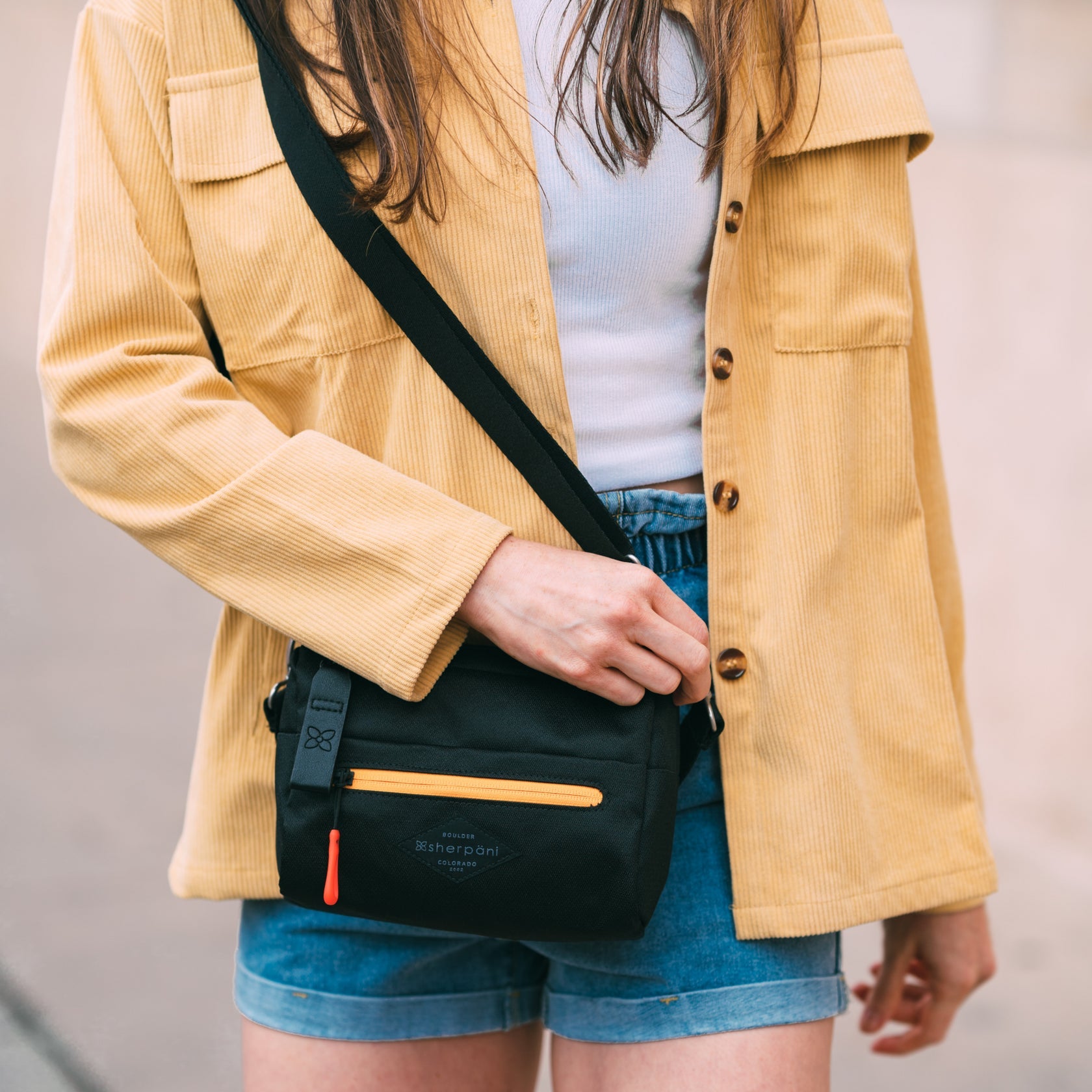 Sherpani Skye Mini bolso cruzado y bolso de hombro